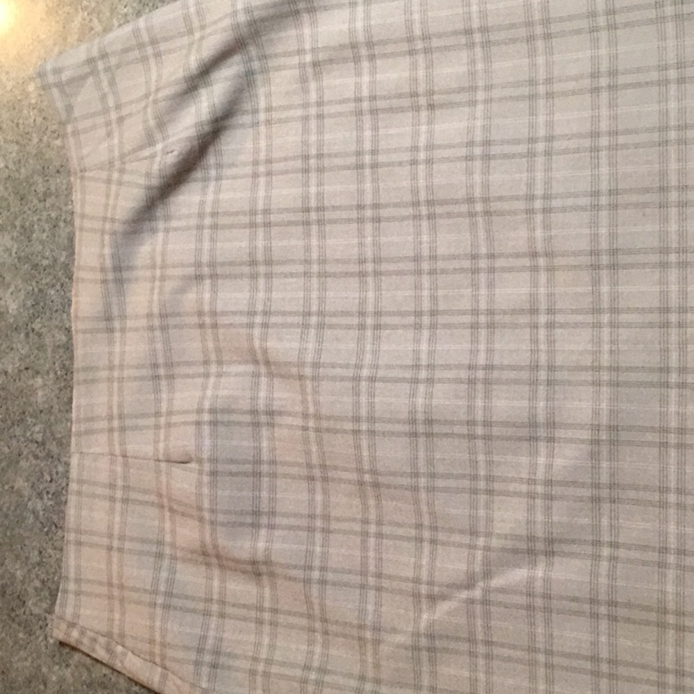 Beige and black check lined skirt.